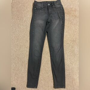 Chic Black Skinny Jeans with Eyelet Details